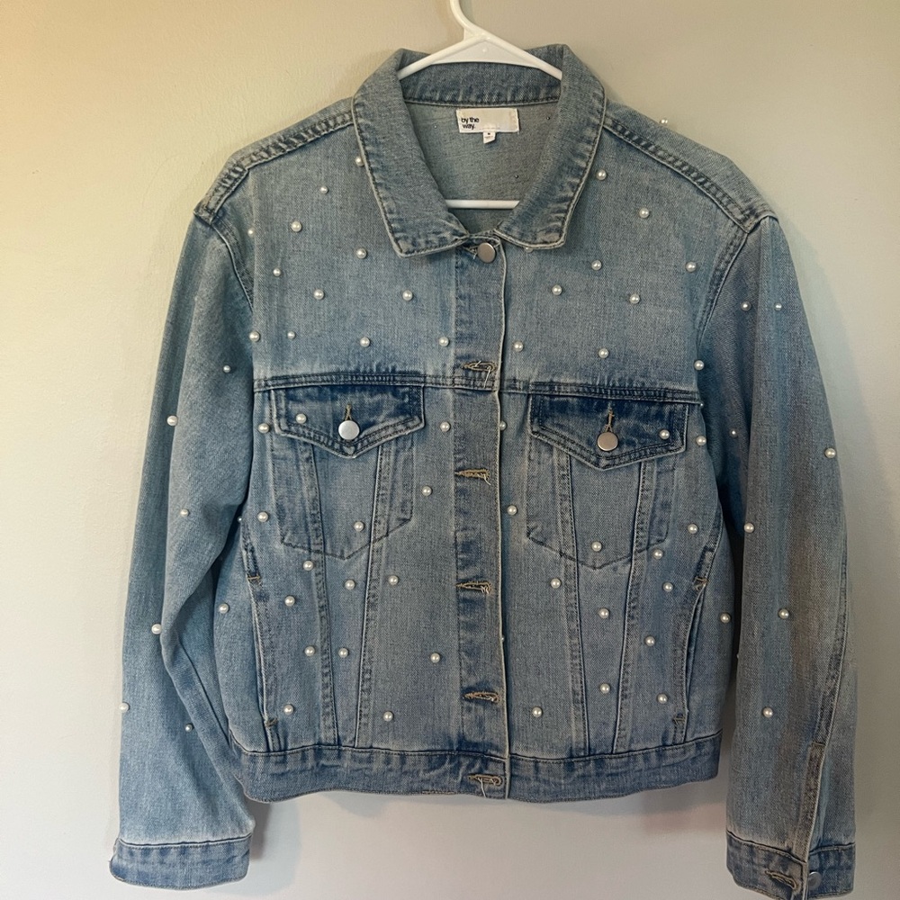 Denim jacket with pearl embellishments